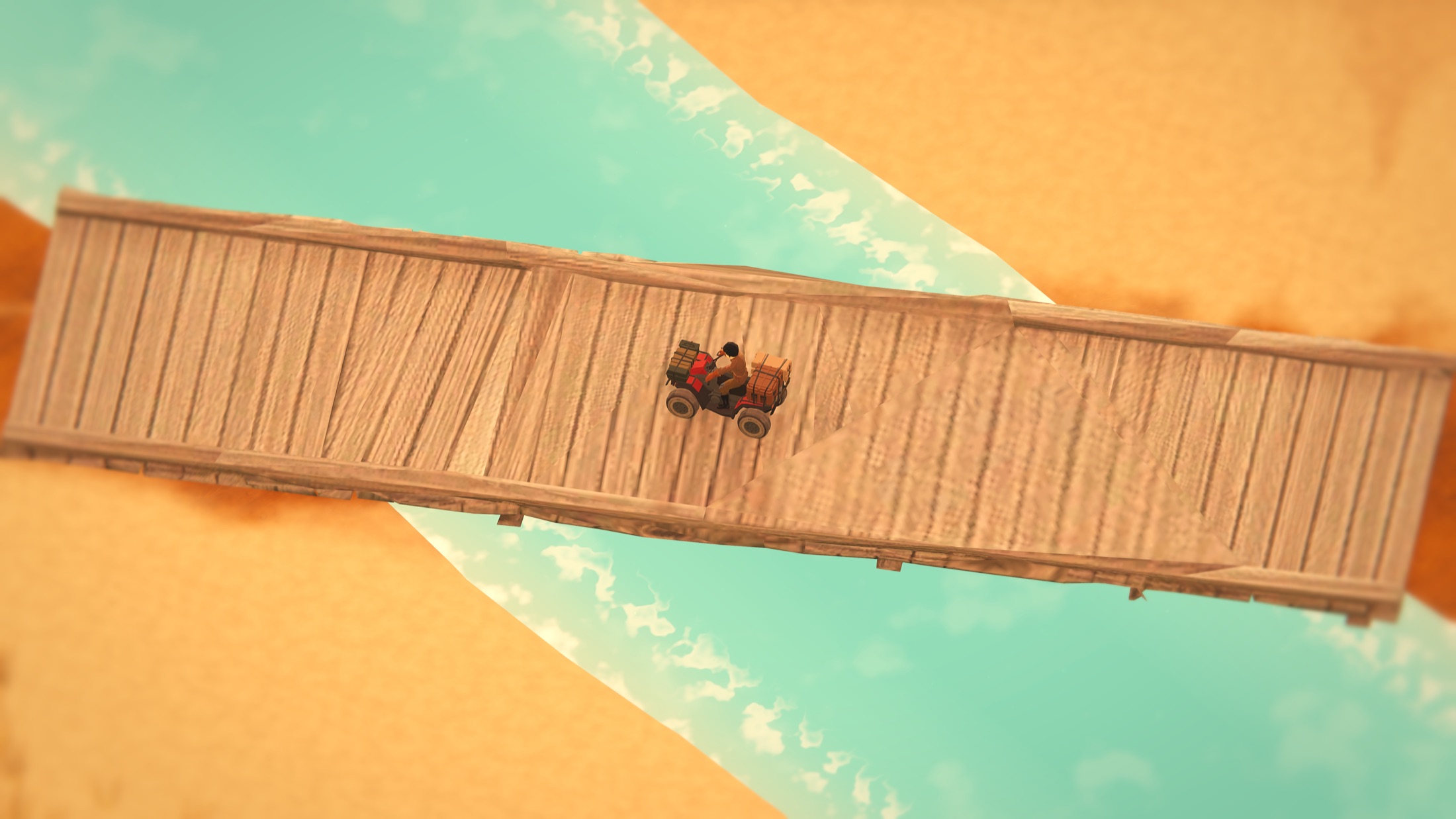 The quad parked mid-way across a long wooden bridge over turquoise water.