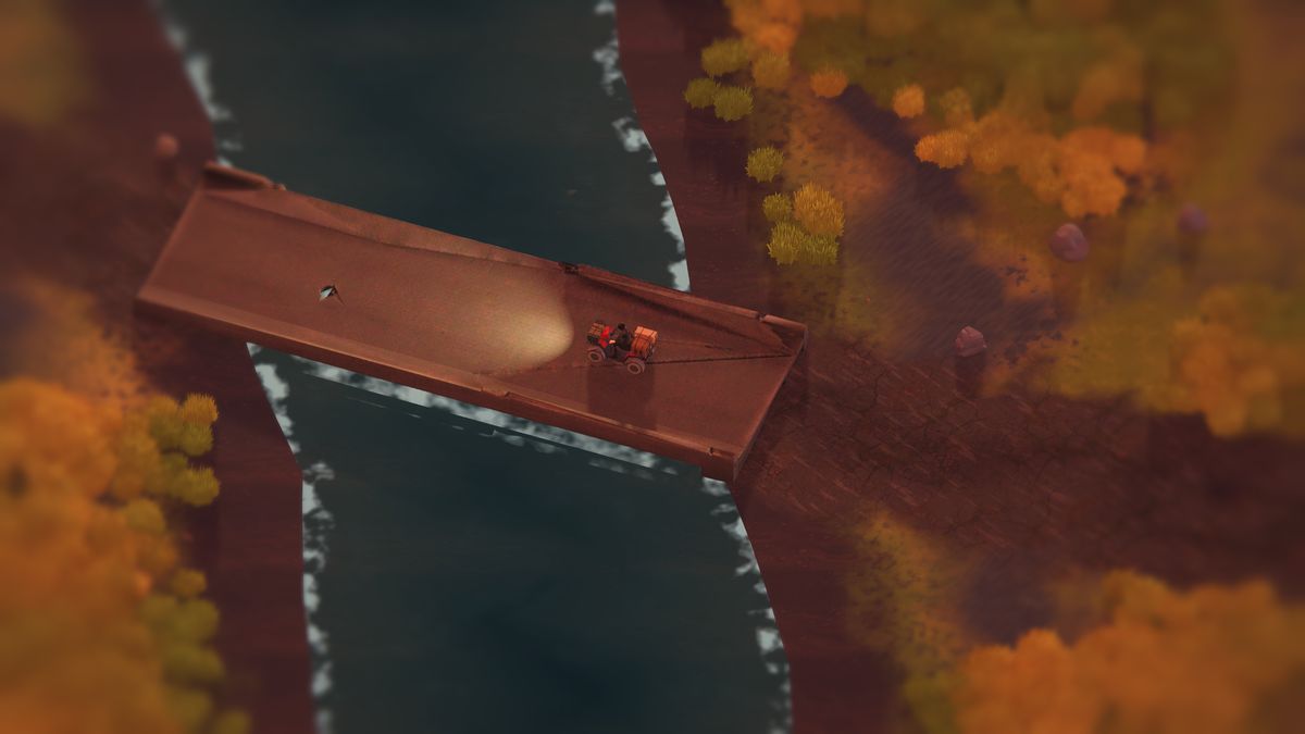 At coral sunset the quad bike drives onto a concrete bridge, its headlight cone spread across the deck above a dark river.
